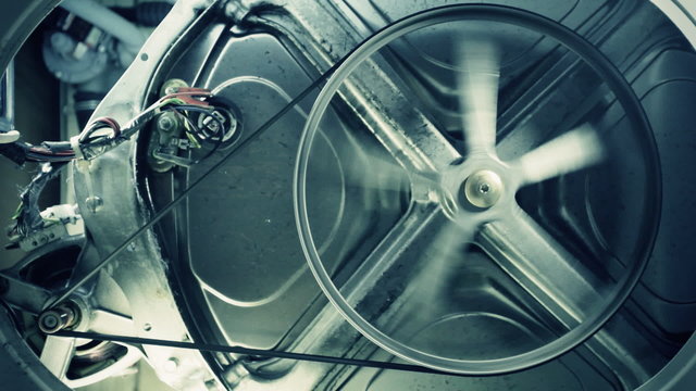 Rotation of a wheel of the washing machine.