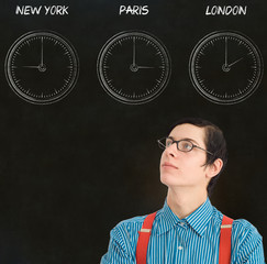 Nerd geek businessman time difference blackboard background