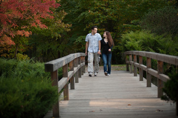 Loving couple walking in the autumn park