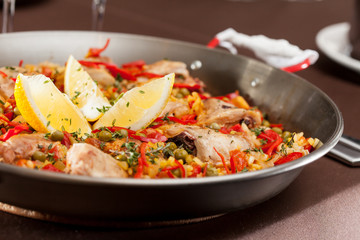 paella with rabbit in a pan