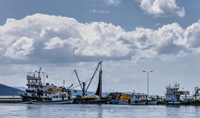 Fototapeta premium Small fishing boats in Akyaka harbor, Turkey