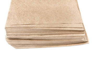 Stack Of Recycled Paper envelopes isolated on white background,