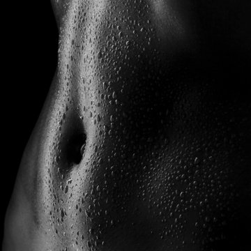 sexy women's tummy in drops of sweat, ABS