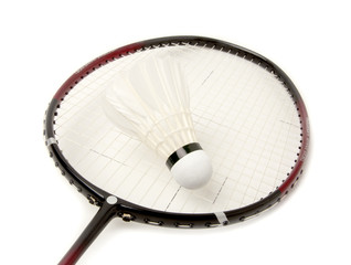 Shuttlecock and badminton racket.