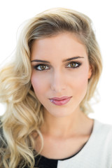 Naklejka premium Content beautiful blonde model looking at camera