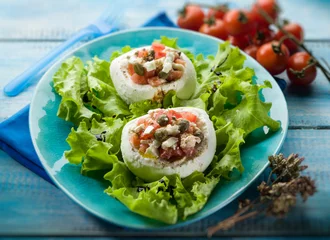 Foto op Plexiglas mozzarella stuffed with capers and tomatoes, selective focus © Marco Mayer