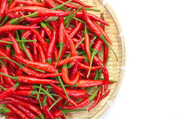 group of red chilies on white background
