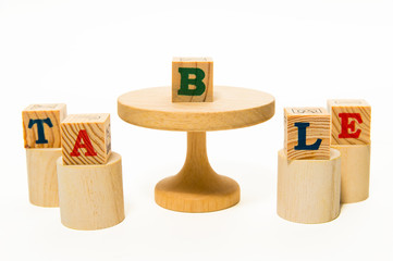 Wood table and stool with wood block