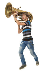 The young man holds a tuba as the weapon - obrazy, fototapety, plakaty