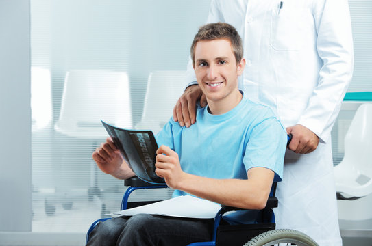 Disabled young man at doctor office