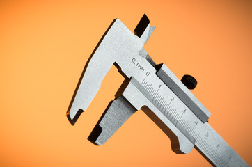 Trammel on orange background
