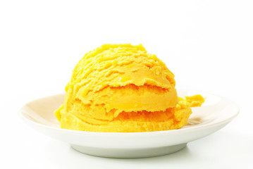 Scoop of yellow ice cream