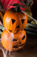 Dark concept of halloween with pumpkins