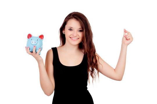 Casual young girl with a blue moneybox