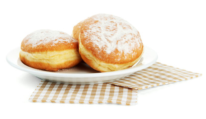 Tasty donuts on plate, isolated on white