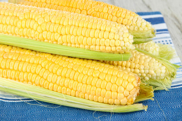 Fresh corn vegetable on wooden table