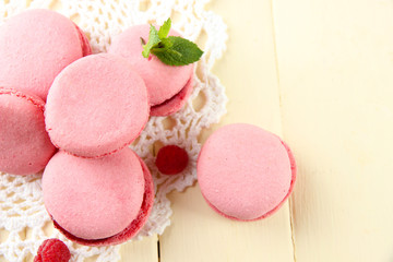 Gentle macaroons on table close-up