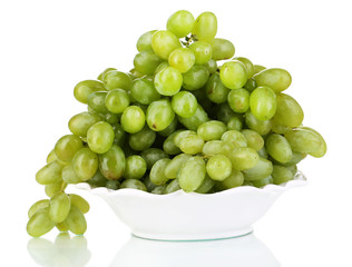 Ripe green grapes on plate isolated on white