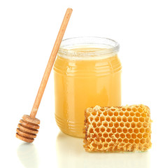 Sweet honeycomb and bank with honey isolated on white