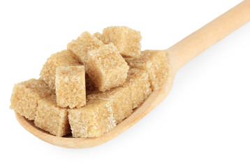 Brown sugar in spoon isolated on white