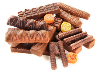 Delicious chocolate bars with marmalade sweets close up