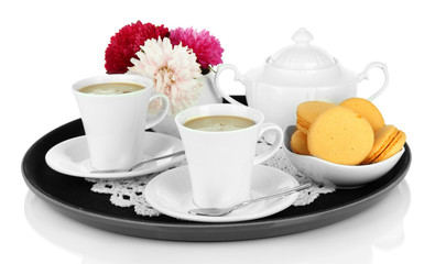 Cups of coffee on tray isolated on white