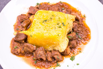 Pork goulash with egg on rice