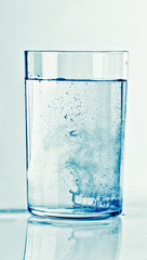 Fizzy tablet in a glass of water
