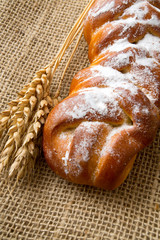 fresh buns and bread on burlap