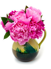 pink peonies in a green vase