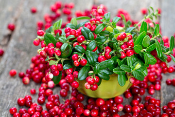 cowberries on wooden surface