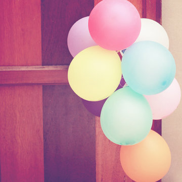 Multicolored Balloons Hanging On Door