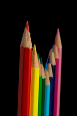 Color pencils isolated on black