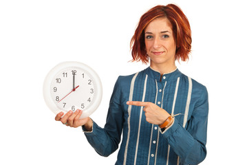 Business woman showing to twelve time