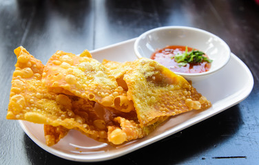 Fried pork dumplings on plate
