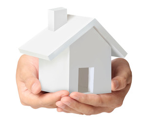 holding house representing home ownership