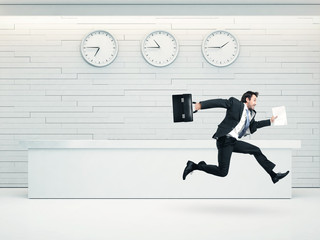 office interior with running businessman