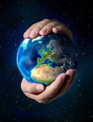 earth in the hands - Europe - universe background