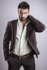 Elegant young handsome man. Studio fashion portrait.