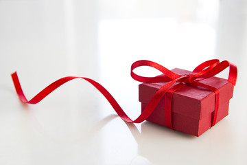 red gift box over white table