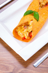 Mexican enchiladas on the plate