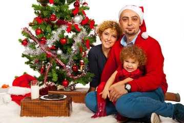 Obraz na płótnie Canvas Beautiful family celebrate Christmas
