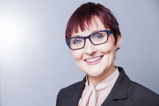 studio portraits of a young well educated business women