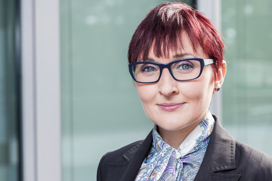 office outdoor portraits of a young well educated business women