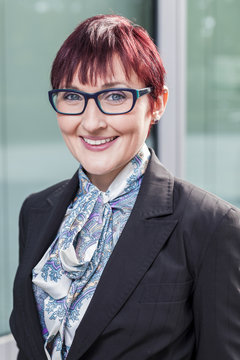 office outdoor portraits of a young well educated business women