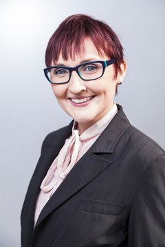 studio portraits of a young well educated business women