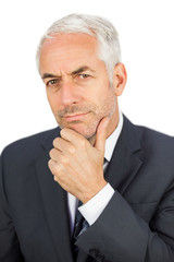 Focused businessman looking at camera