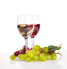 Glasses of white and rose wine and grapes 