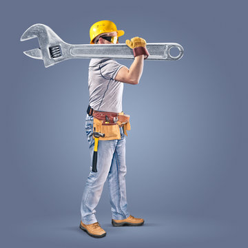 construction worker with a tool belt and a wrench