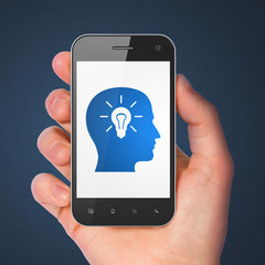 Education concept: Head With Light Bulb on smartphone